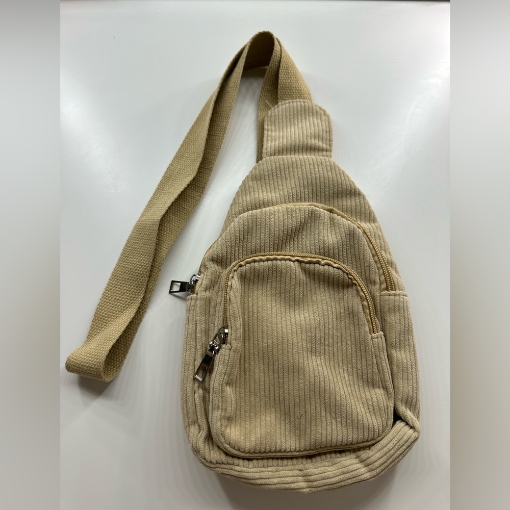 Cream colored crossbody bag